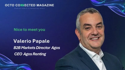 Immagine promozionale di OCTO Connected Magazine con sfondo blu e grafica astratta: ritratto di Valerio Papale, B2B Markets Director Agos e CEO Agos Renting, sorridente in giacca elegante, accompagnato dal testo “Nice to meet you”.